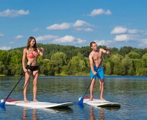 A Couple Paddle Boarding