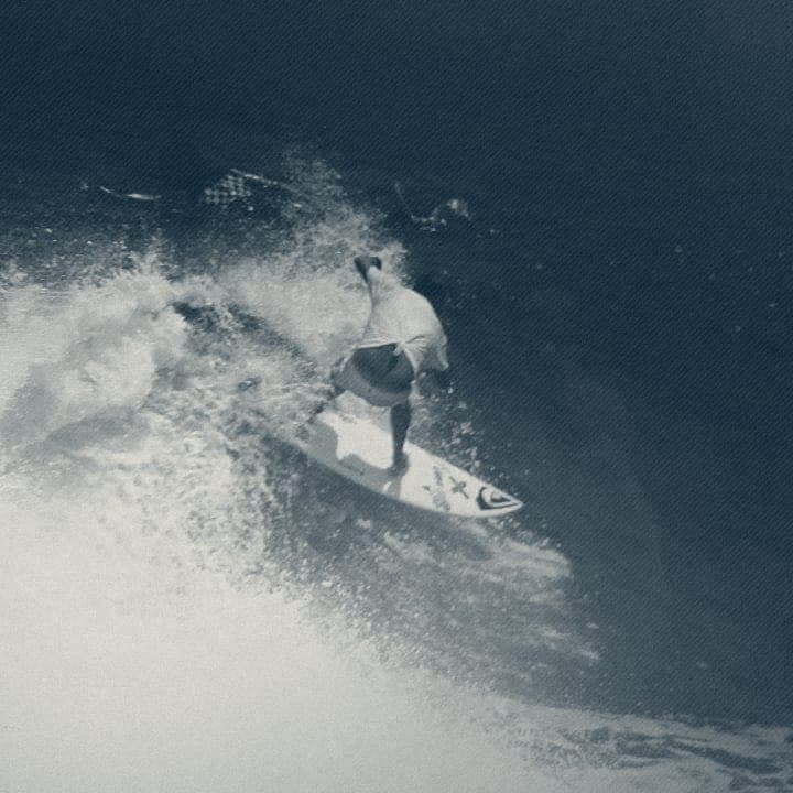 Ryan Ragan carving a large wave, photographed from above