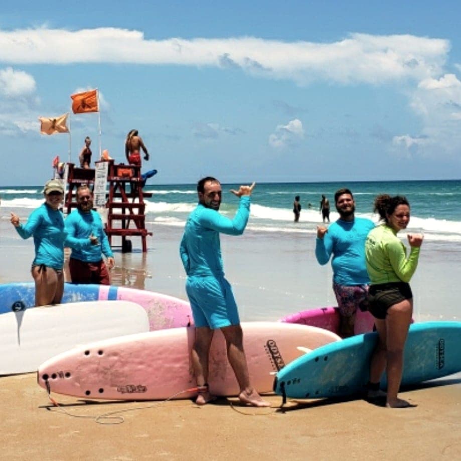 Lesson group with boards near the lifeguard tower at Sunsplash Park